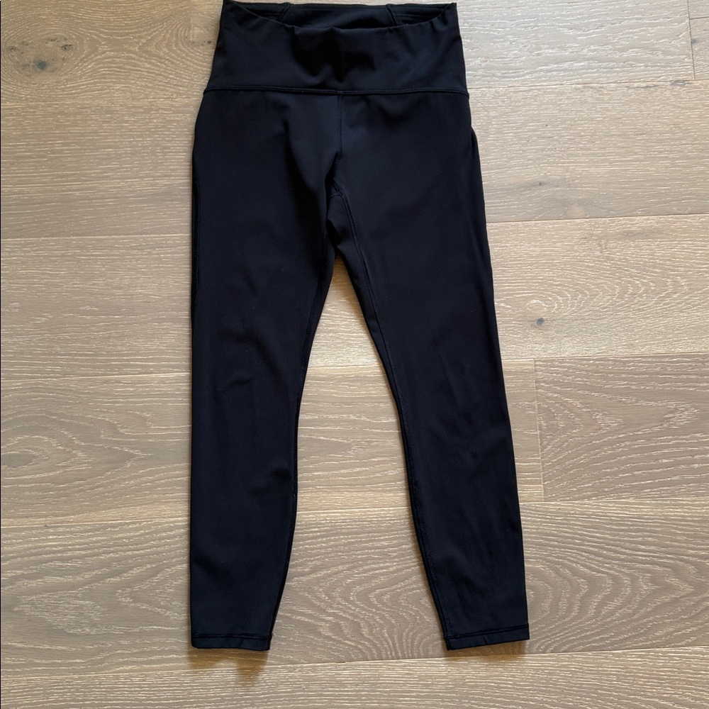 Lulu Lemon Black High-Waisted Leggings. Mesh paneling on side